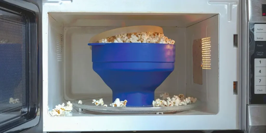 how to microwave popcorn without burning	