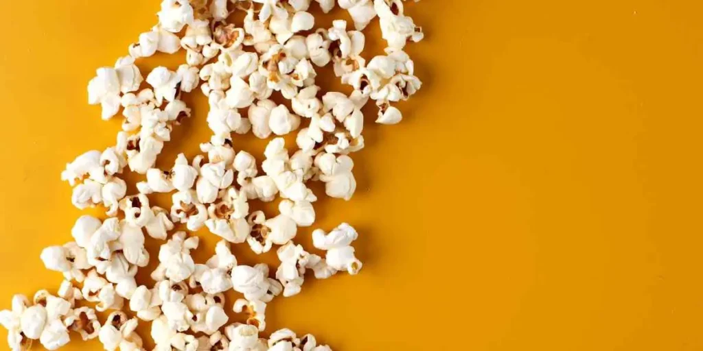 https://snackeagle.com/wp-content/uploads/2022/04/flavor-popcorn-after-a-machine-makes-it-1024x512.webp